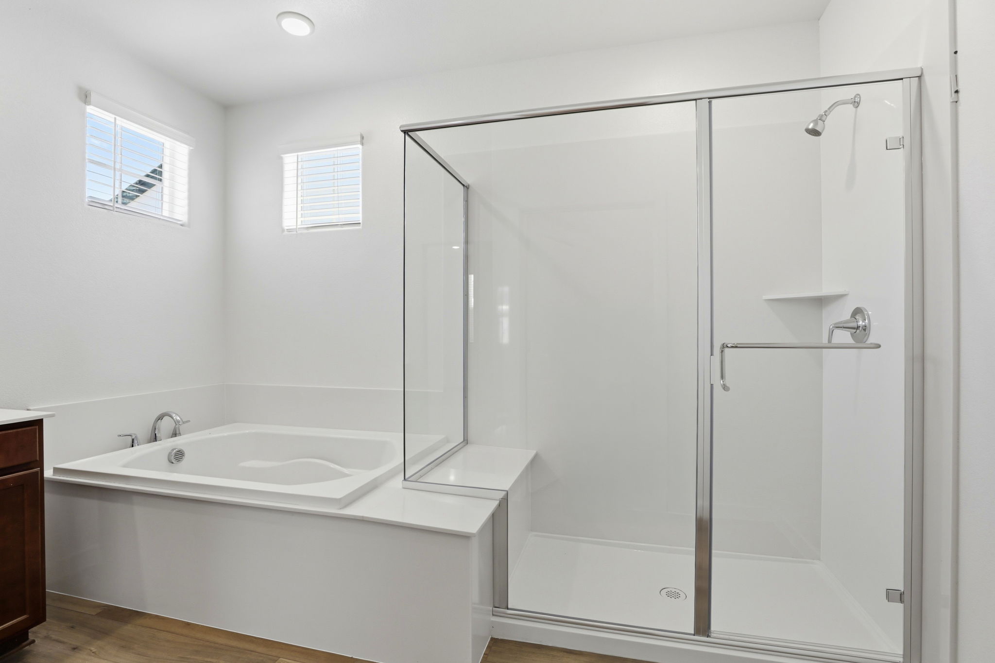 A bathroom with a glass shower.