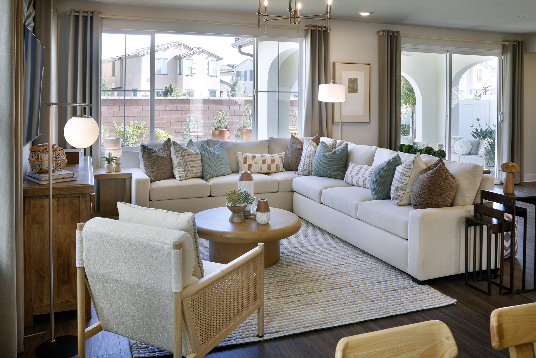 A living room with a large window.