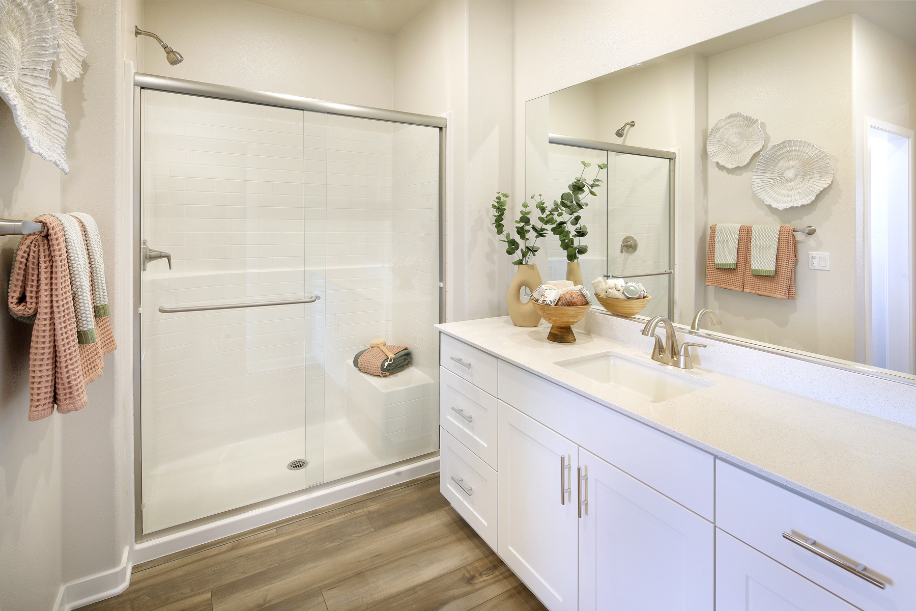 A bathroom with a glass shower.