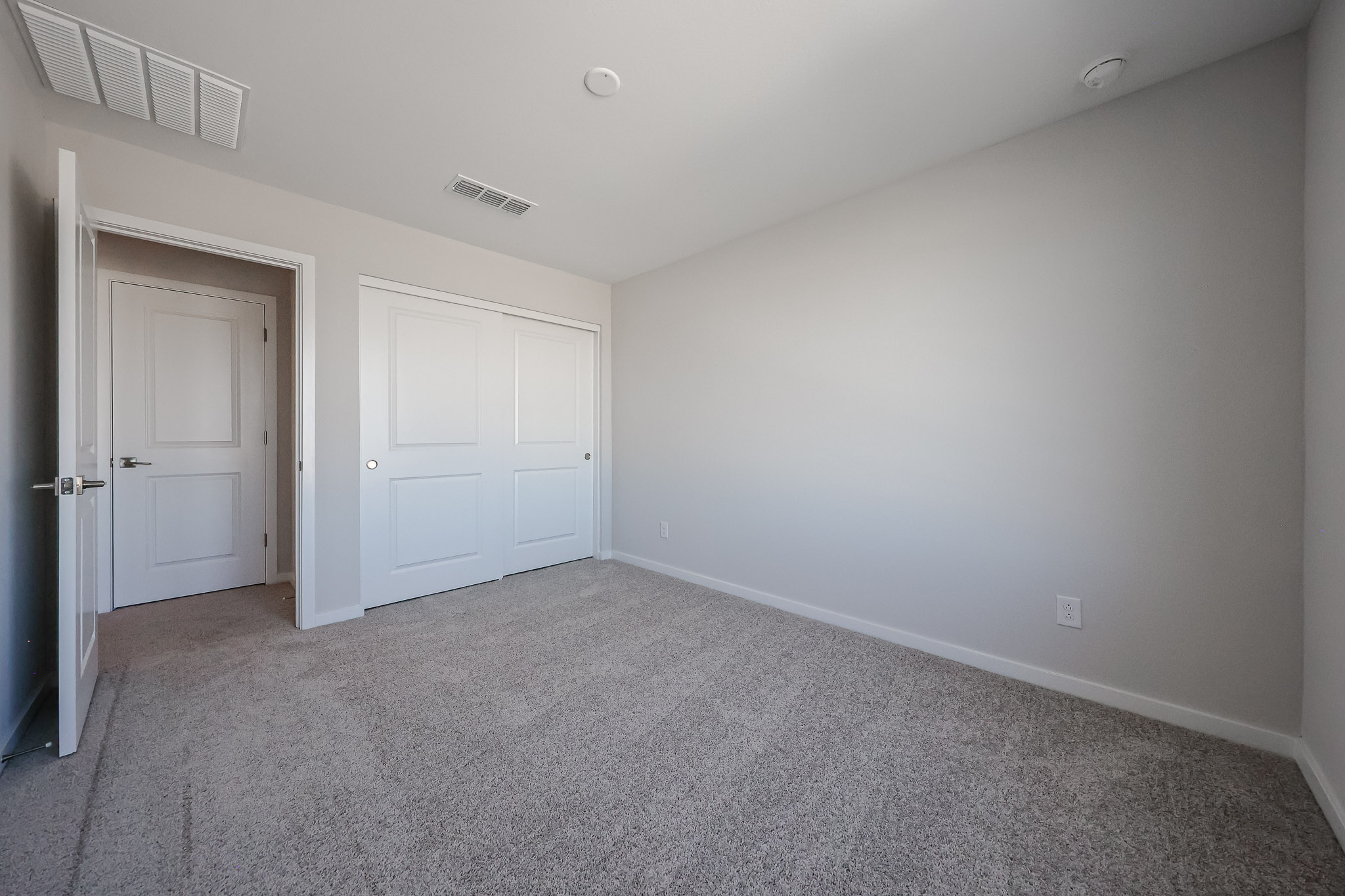 A room with white doors.