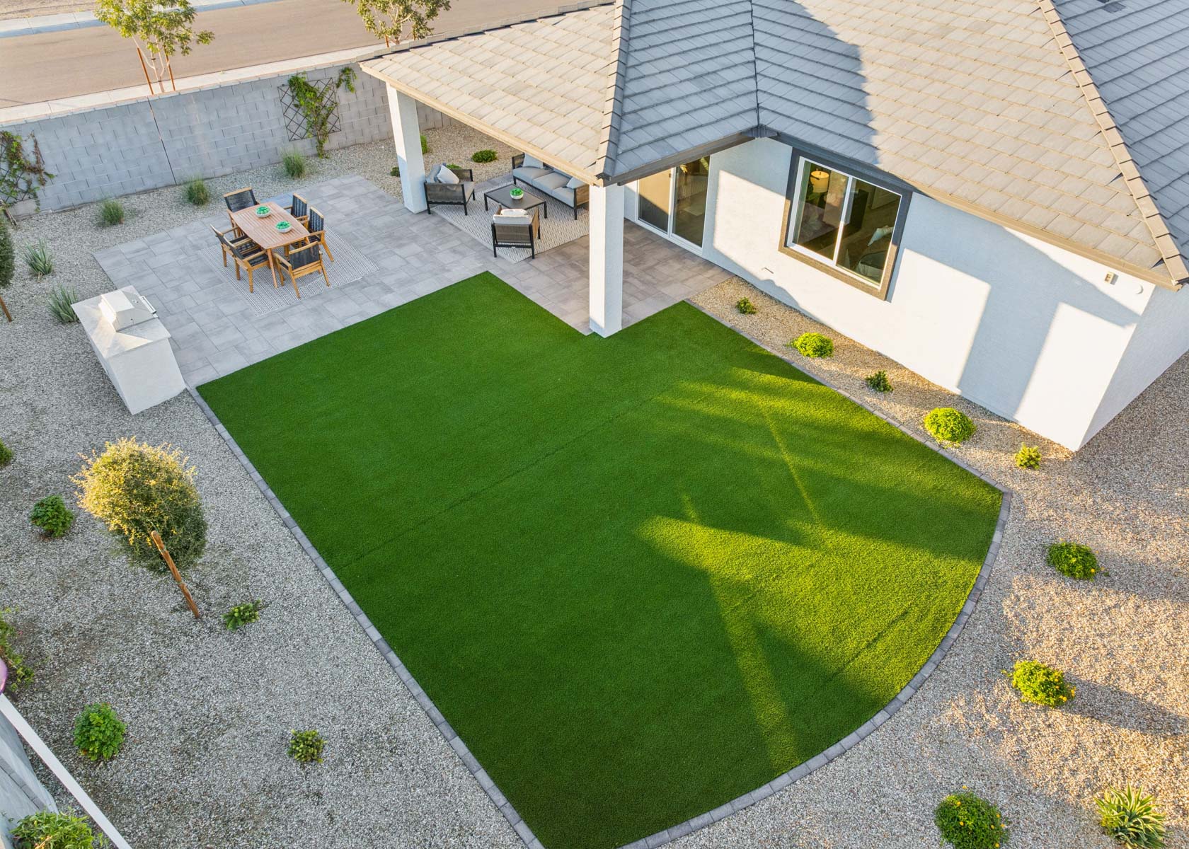 A backyard with a pool.