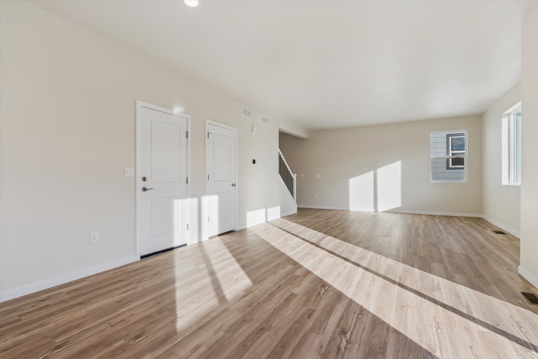 A room with white doors.