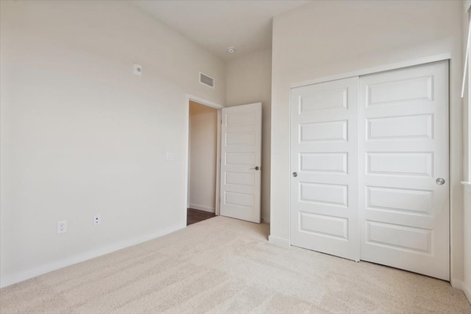 A room with white doors.