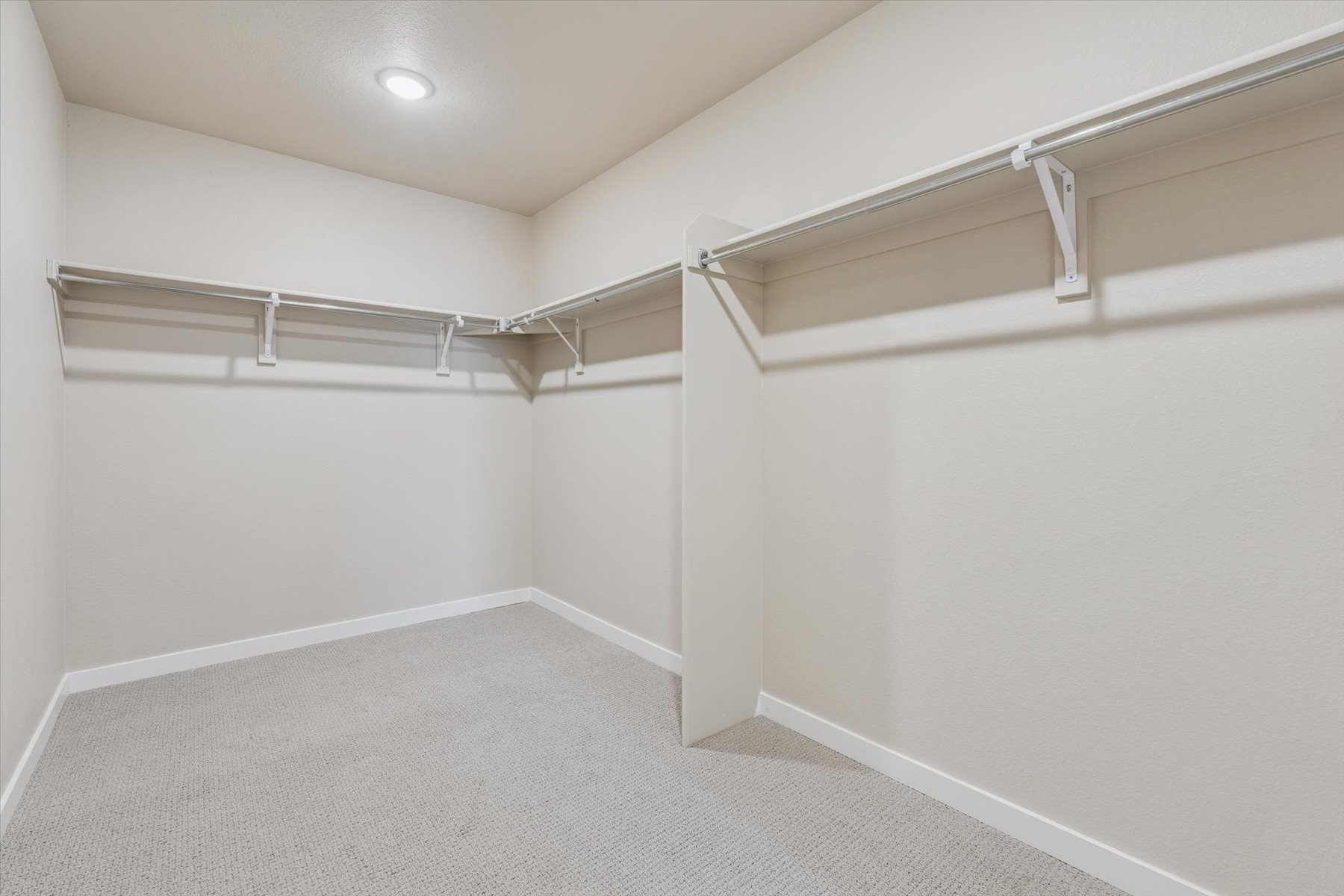 A white hallway with white walls.