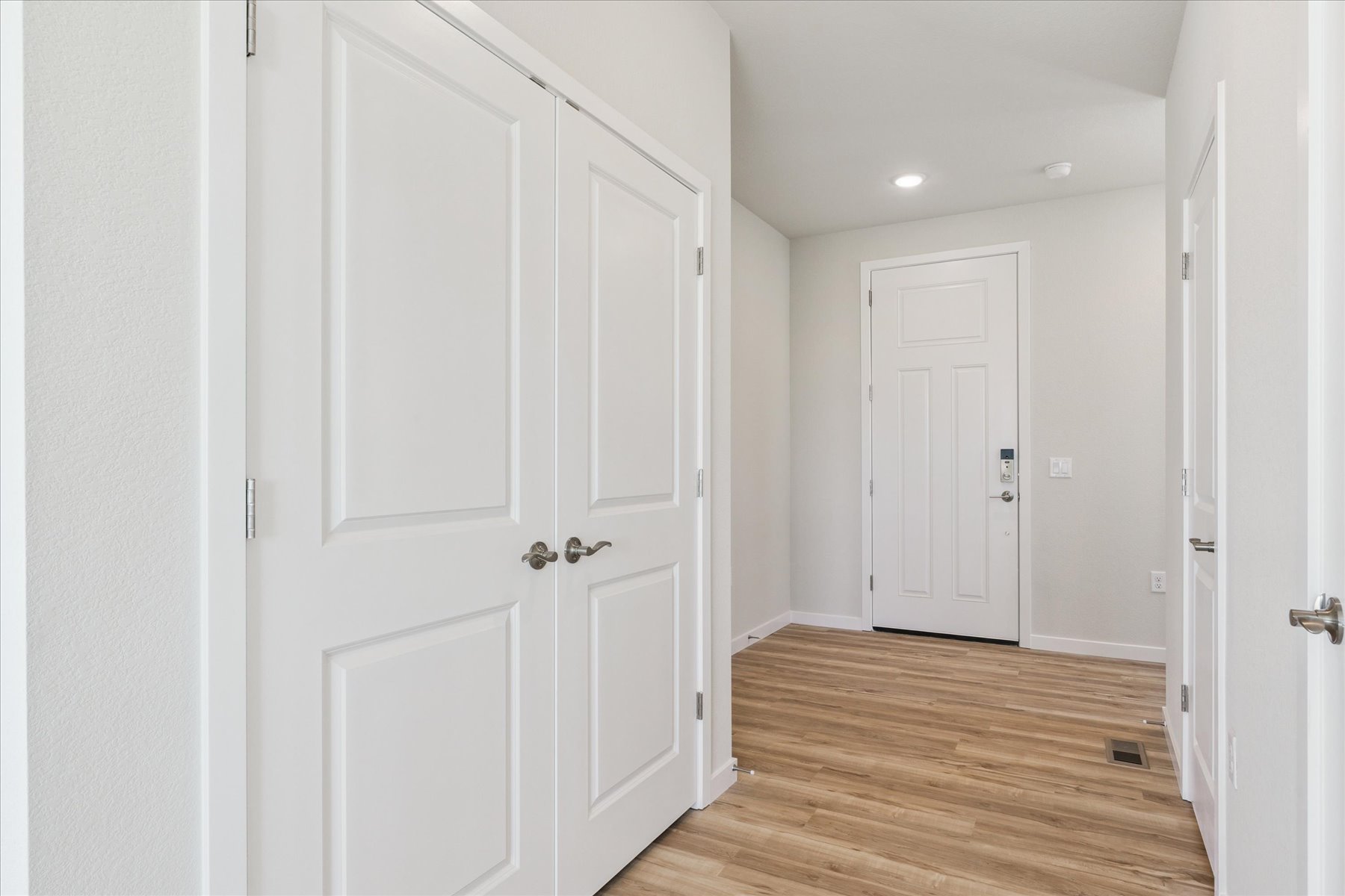 A room with white doors.