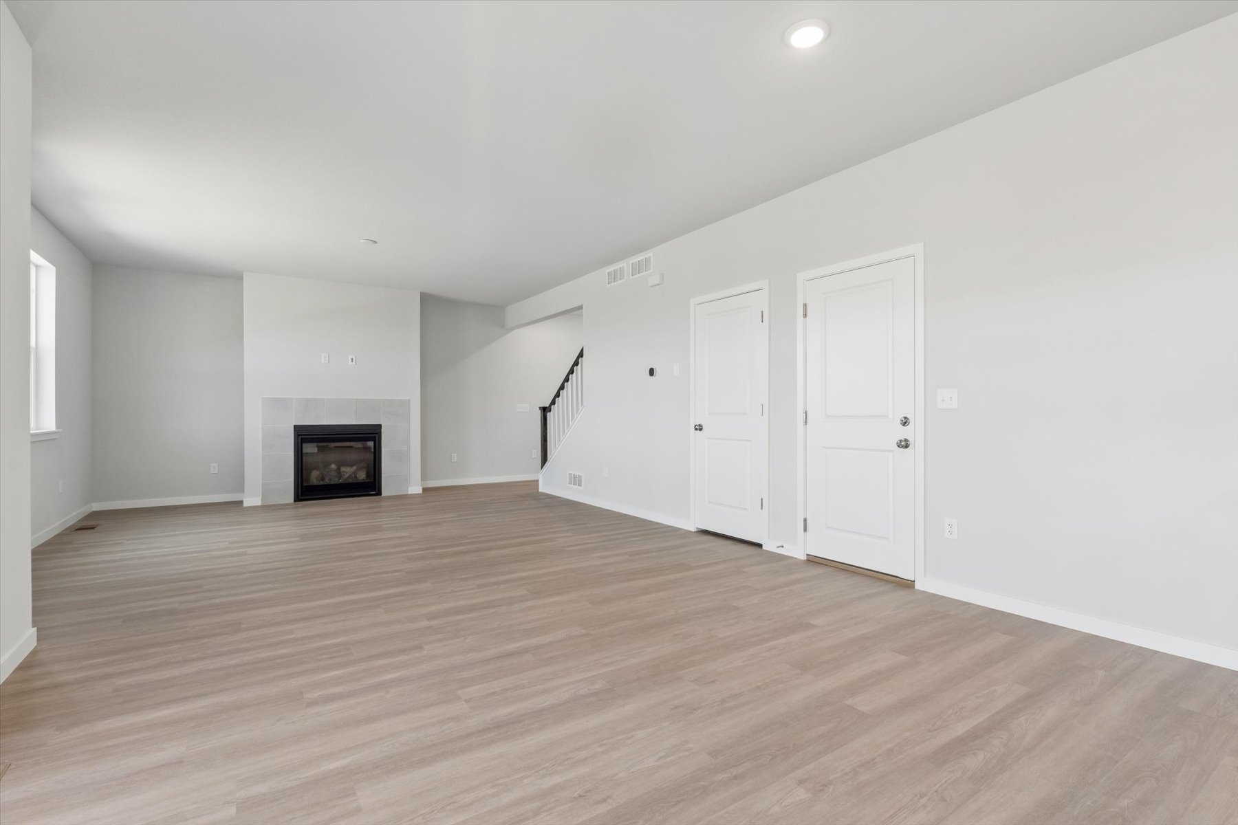 A room with white doors.