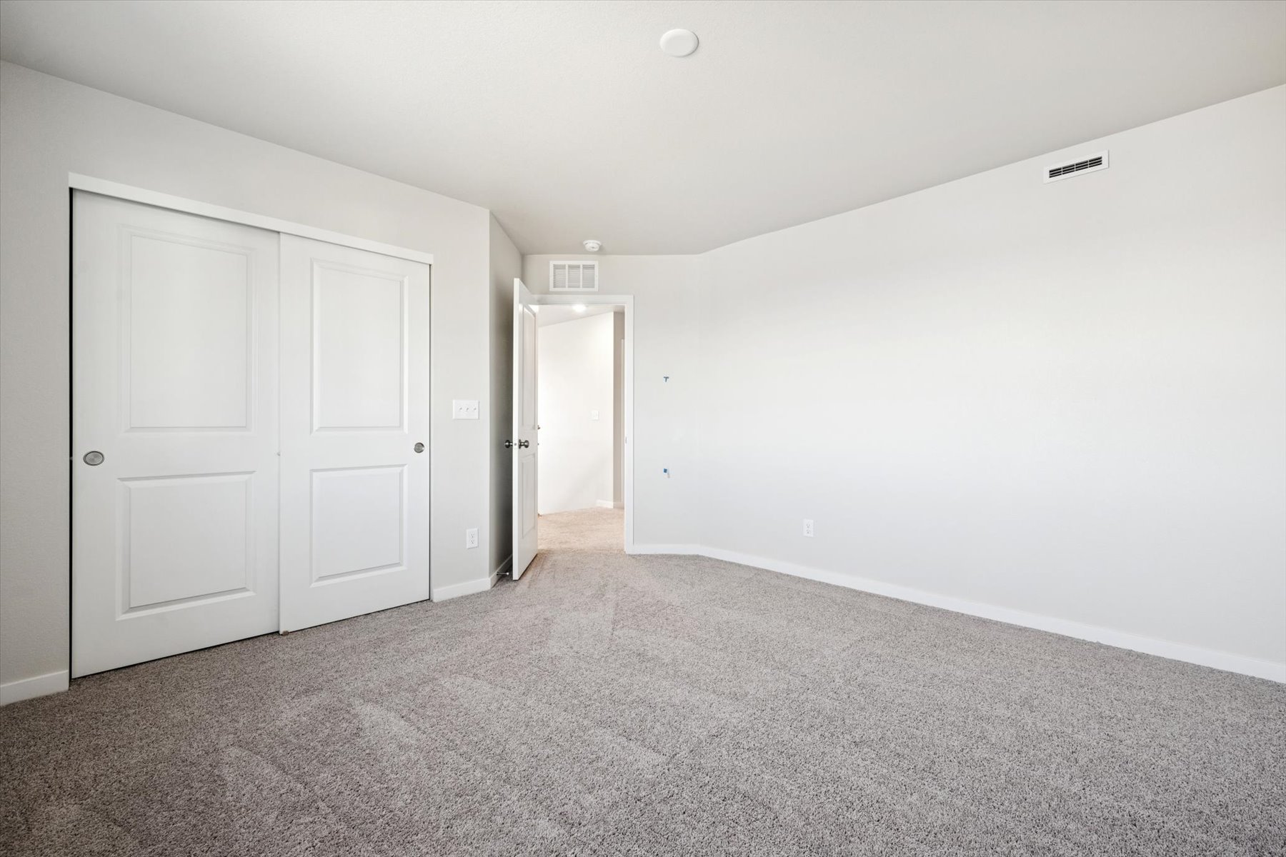 A room with white doors.