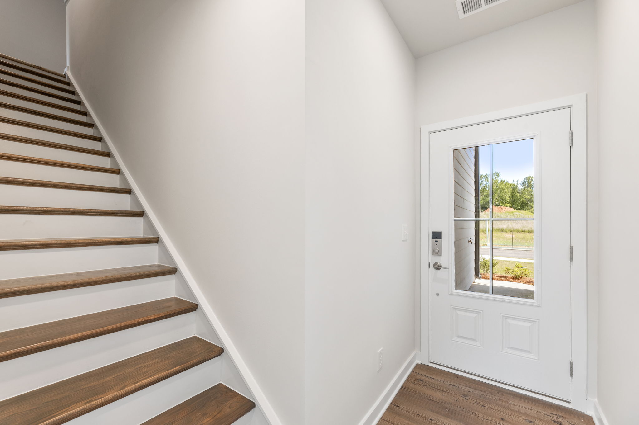 A staircase leading to a door.