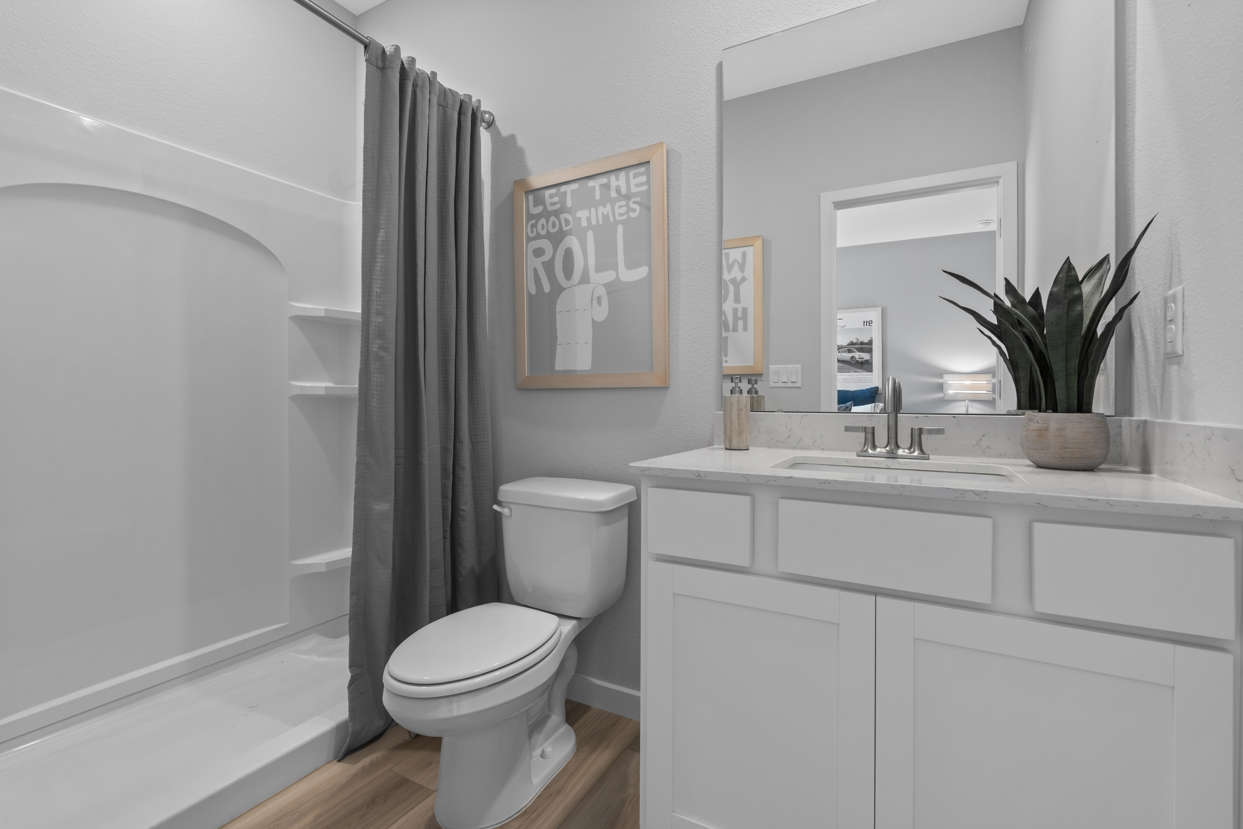 Coronado Model Home Guest Bedroom with Shower at Reserve East in Flagler Beach