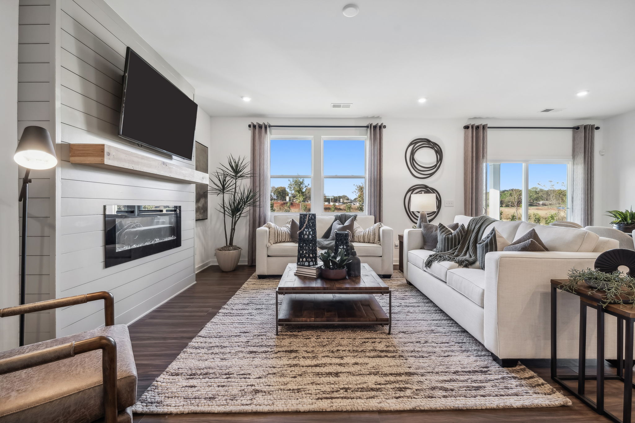 A living room with a fireplace.