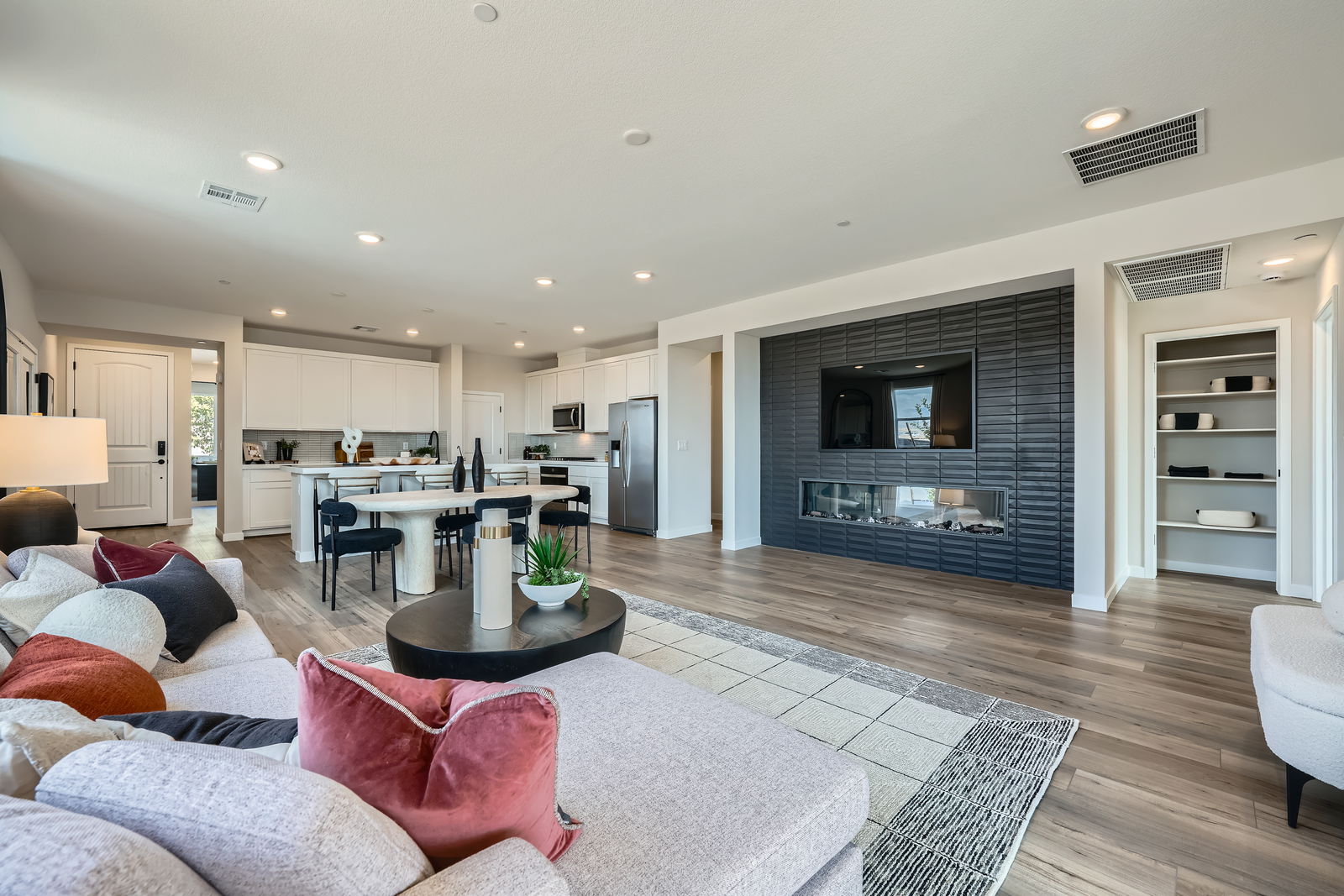 A living room with a fireplace.