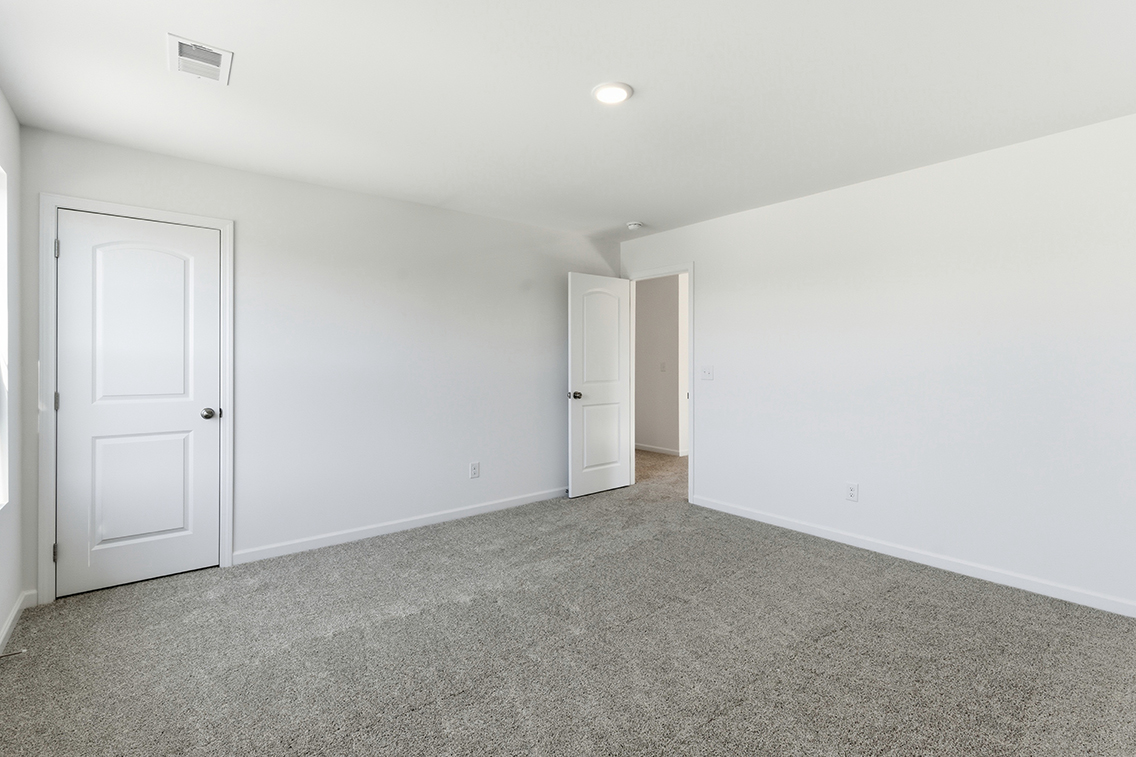 A room with white doors.
