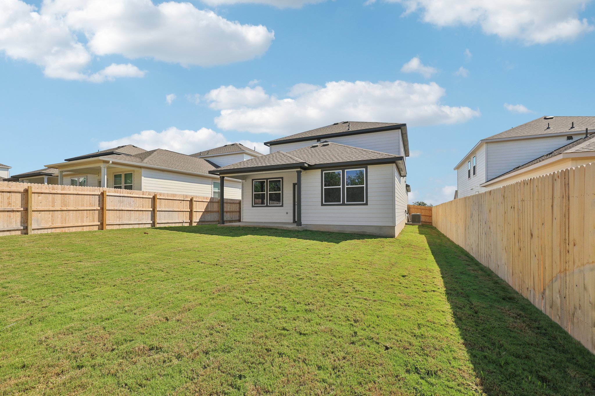 A house with a fence around it.