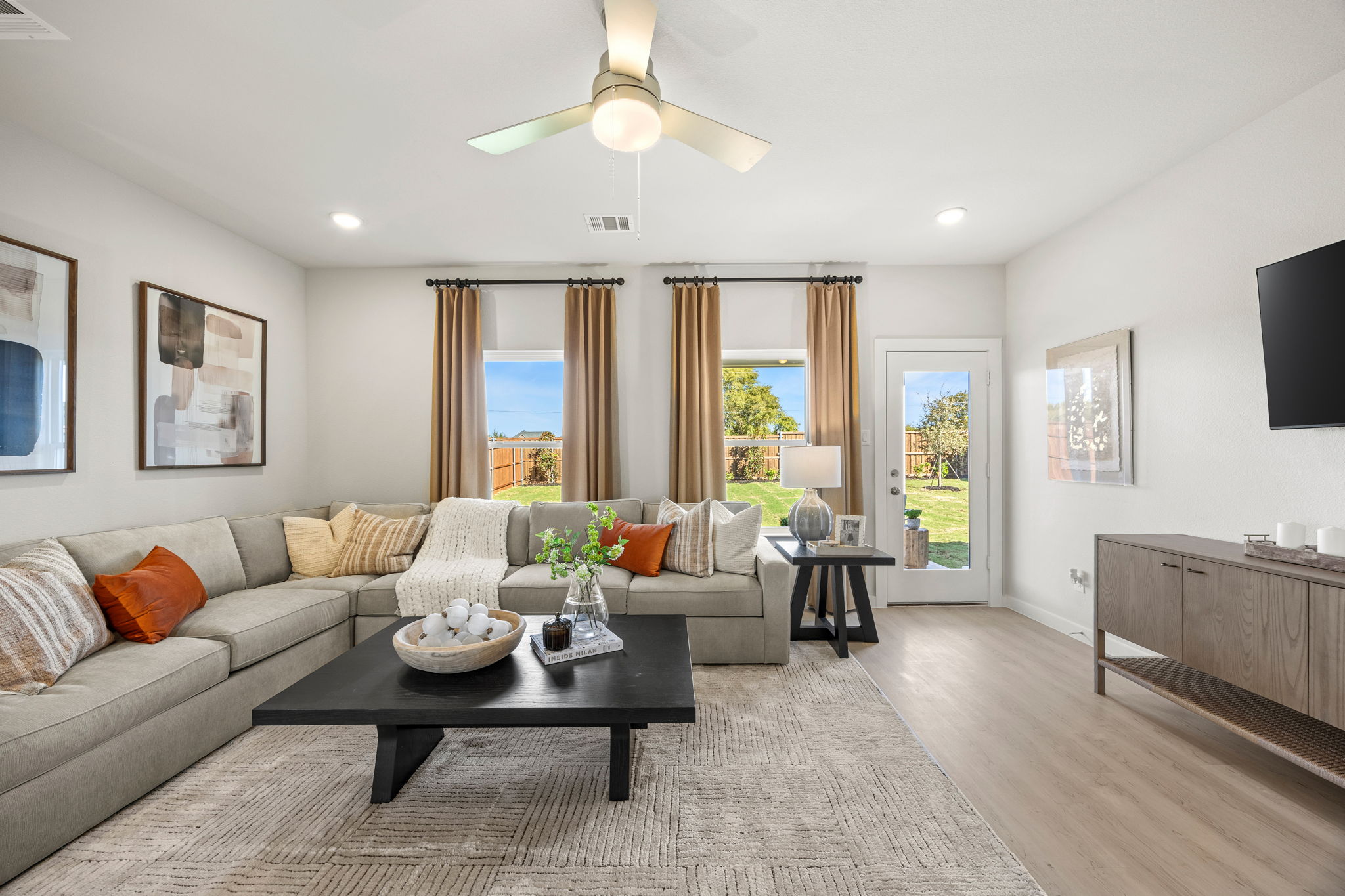 A living room with a large window.