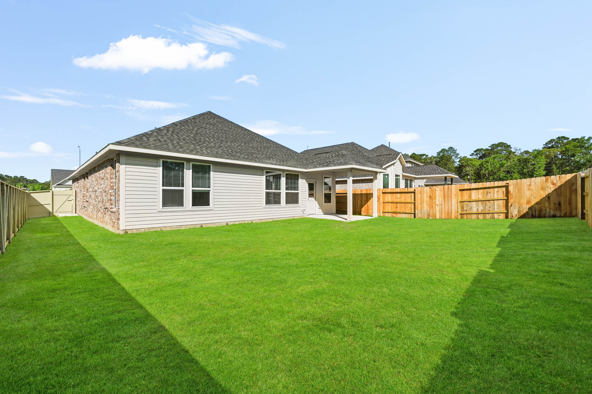 A house with a fence around it.