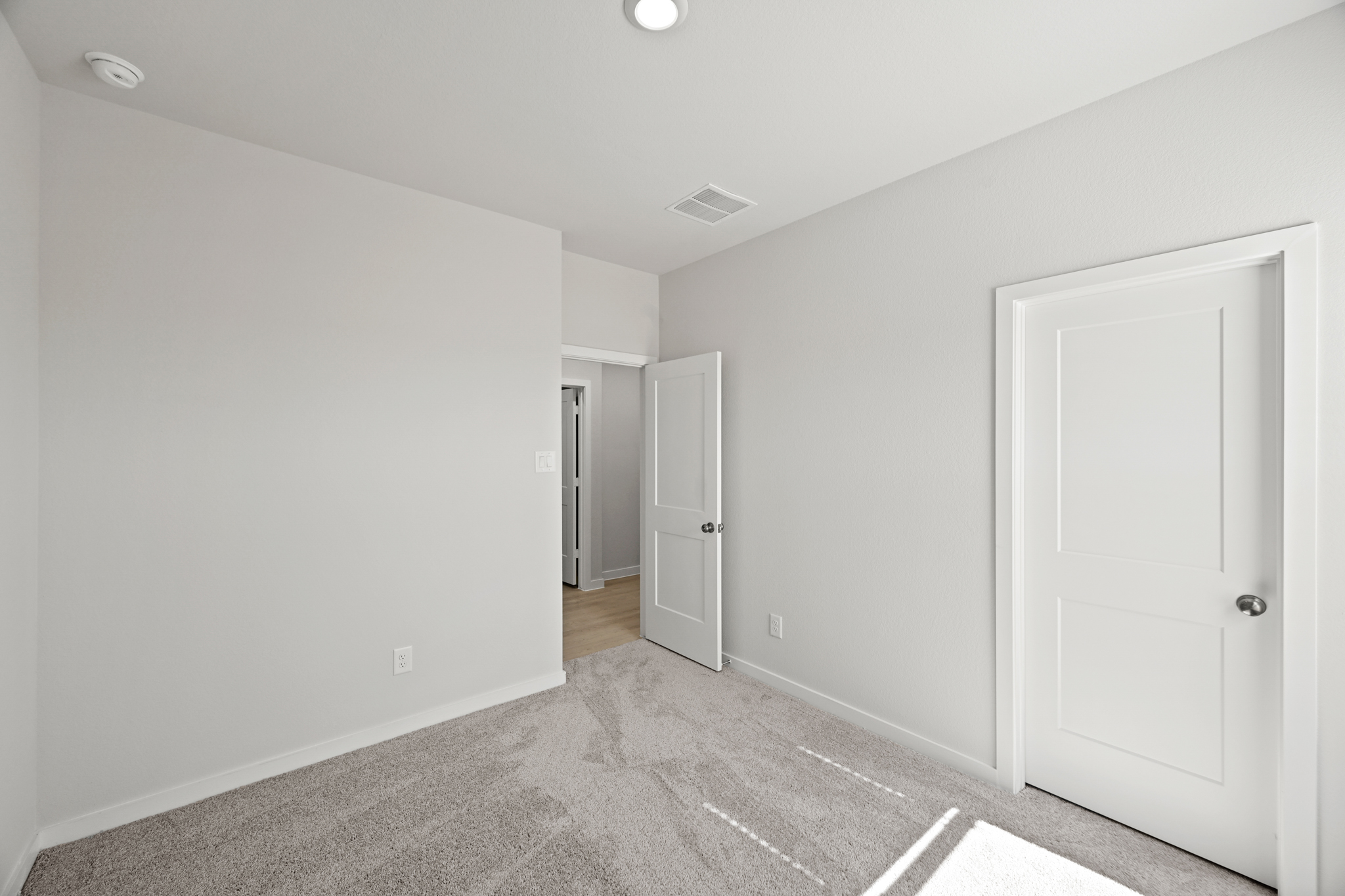 A room with white doors.