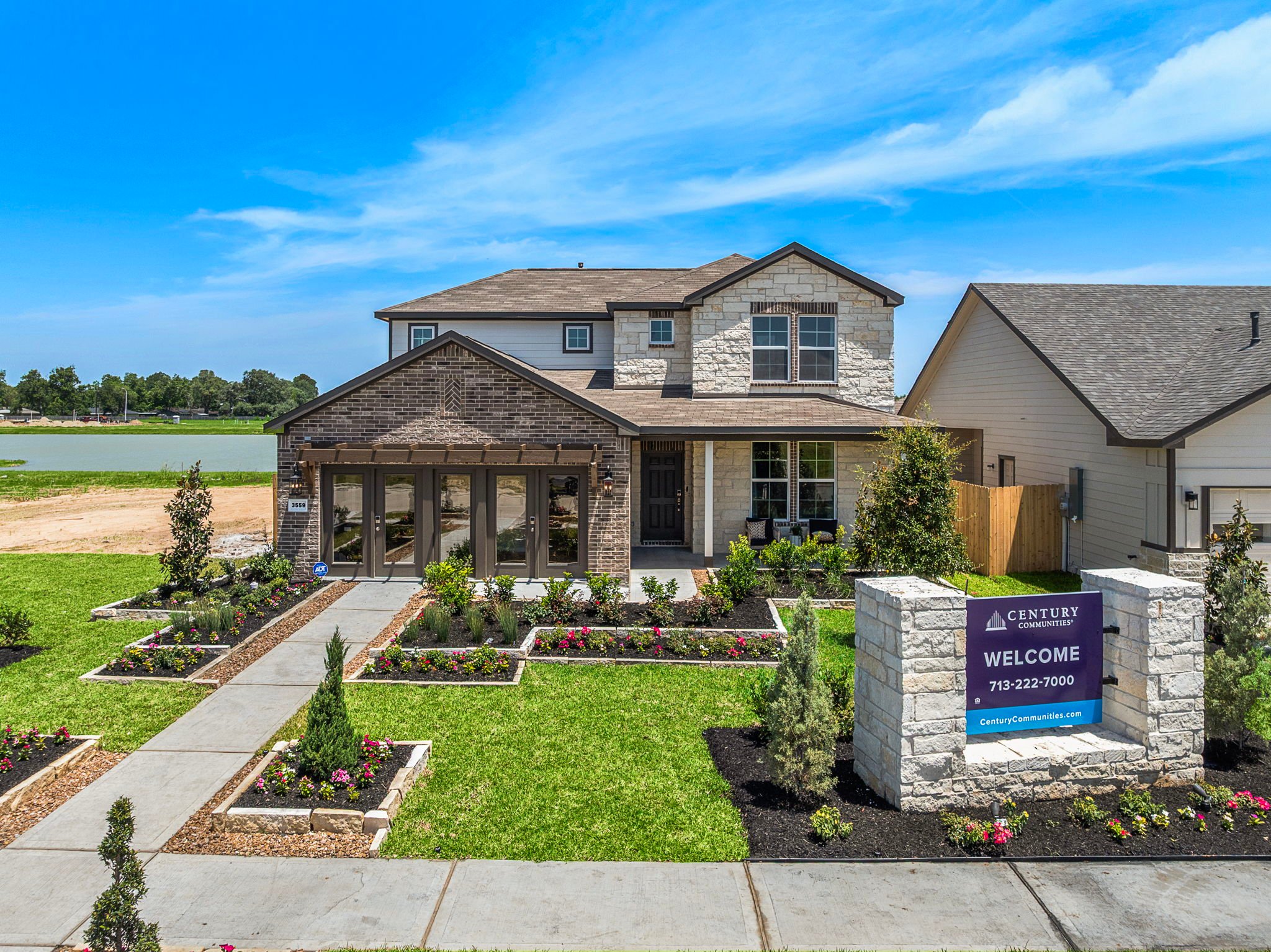 A house with a sign in front.