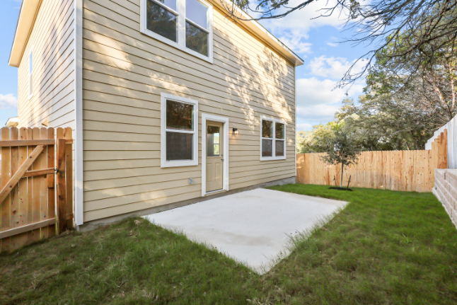 A small house with a small yard.
