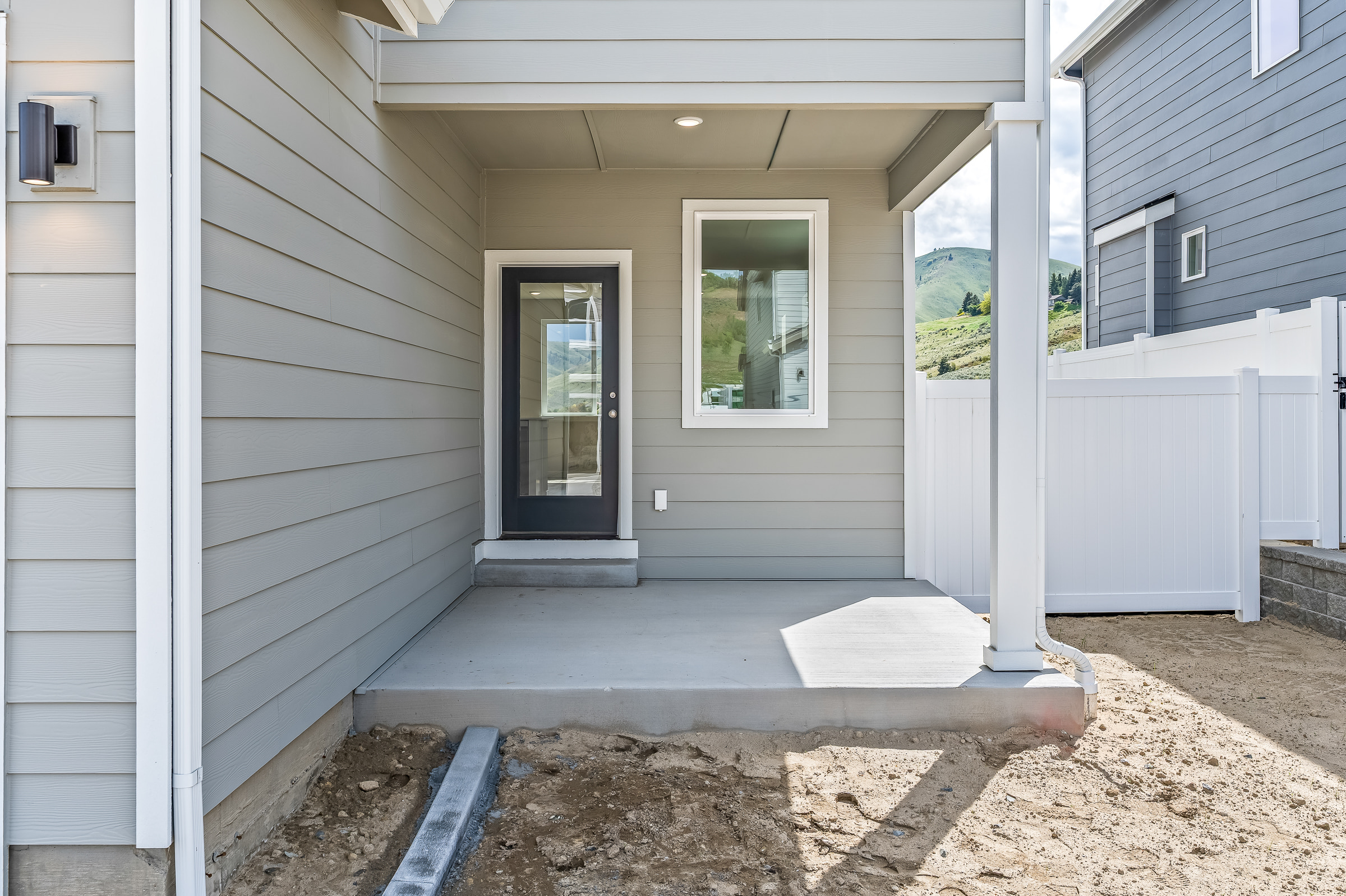 A house with a white fence.