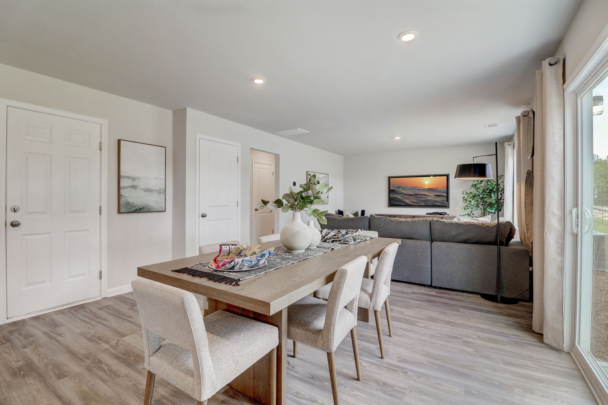 A living room with a couch and a table.