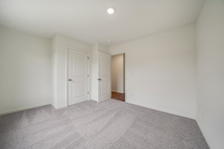 A room with white doors.