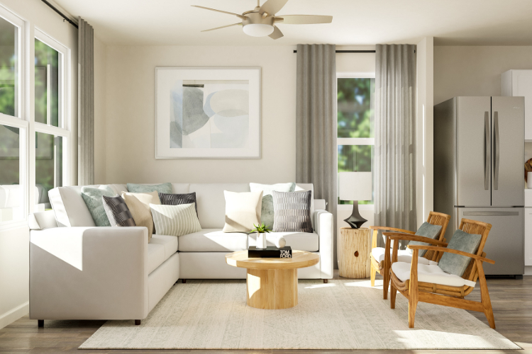 A living room with a couch and a table.
