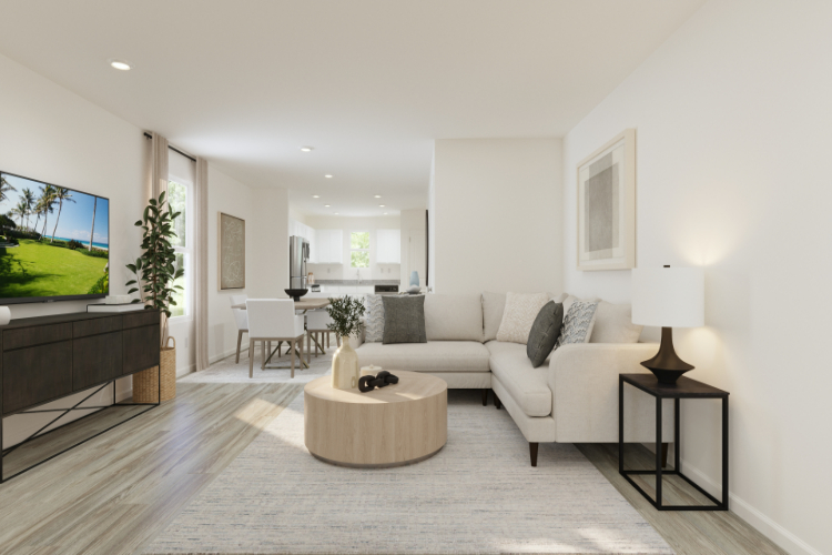 A living room with a large television.