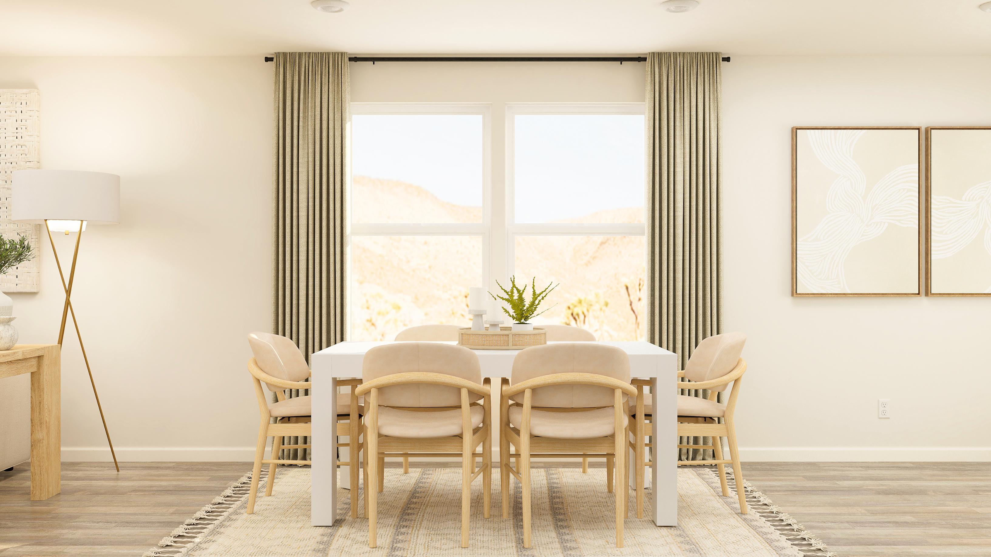 A dining room with a large window.