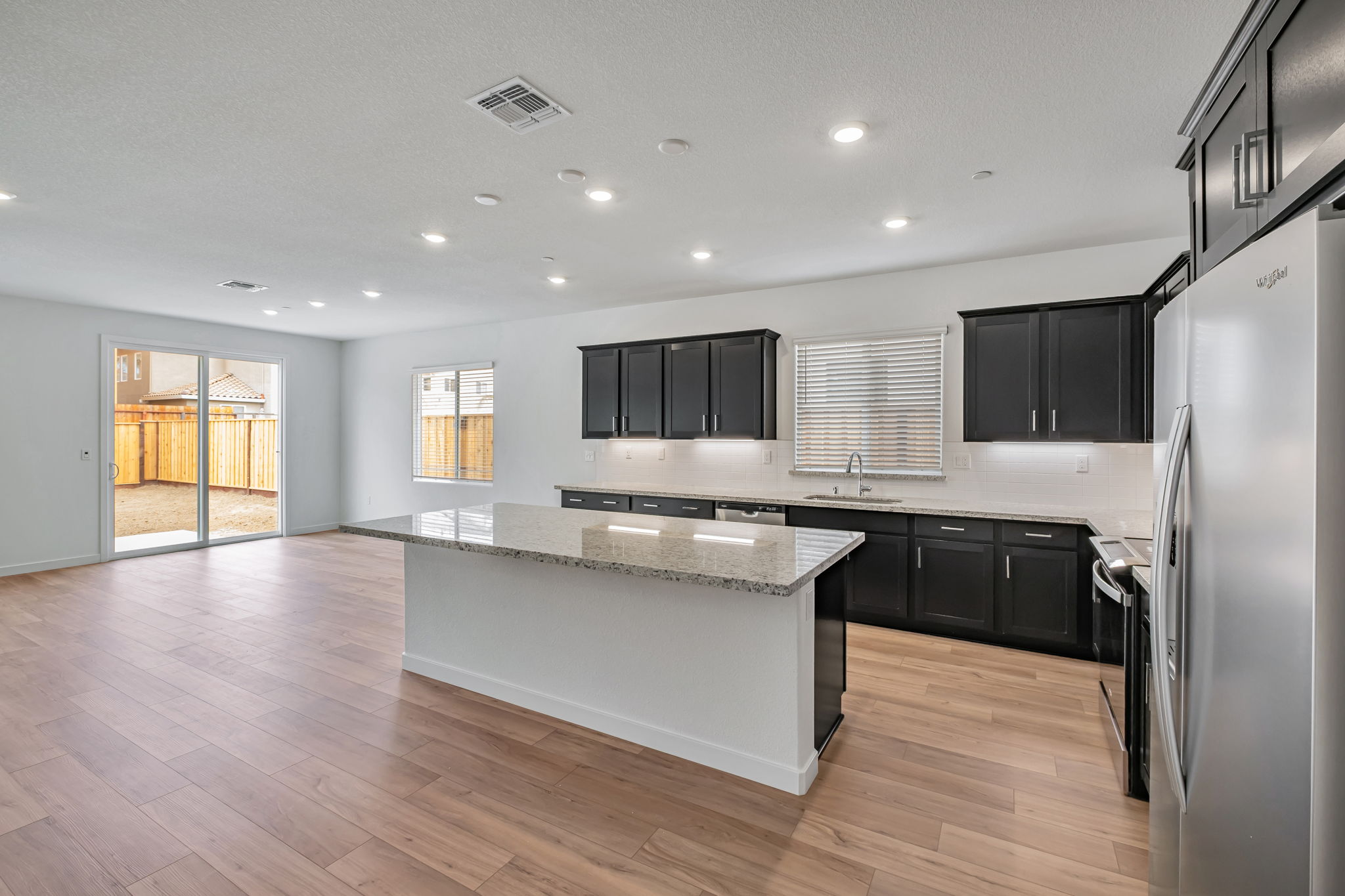 A kitchen with a large island.